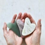 cherrydeck-xYSoOJ1Uz2I-unsplash Gua Sha tool used for facial massage